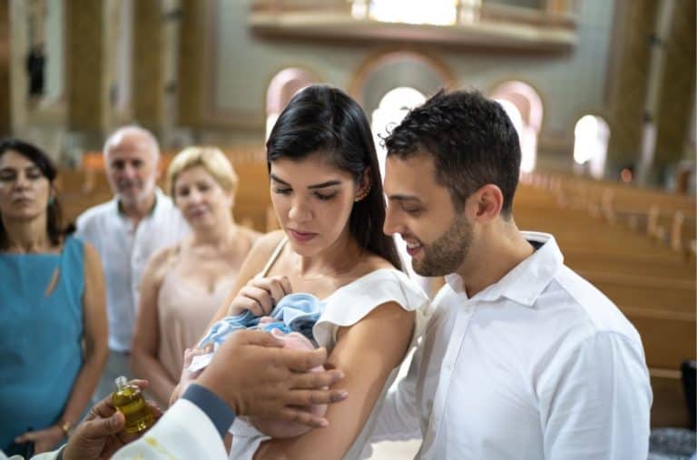 Christian godparents at a baptism